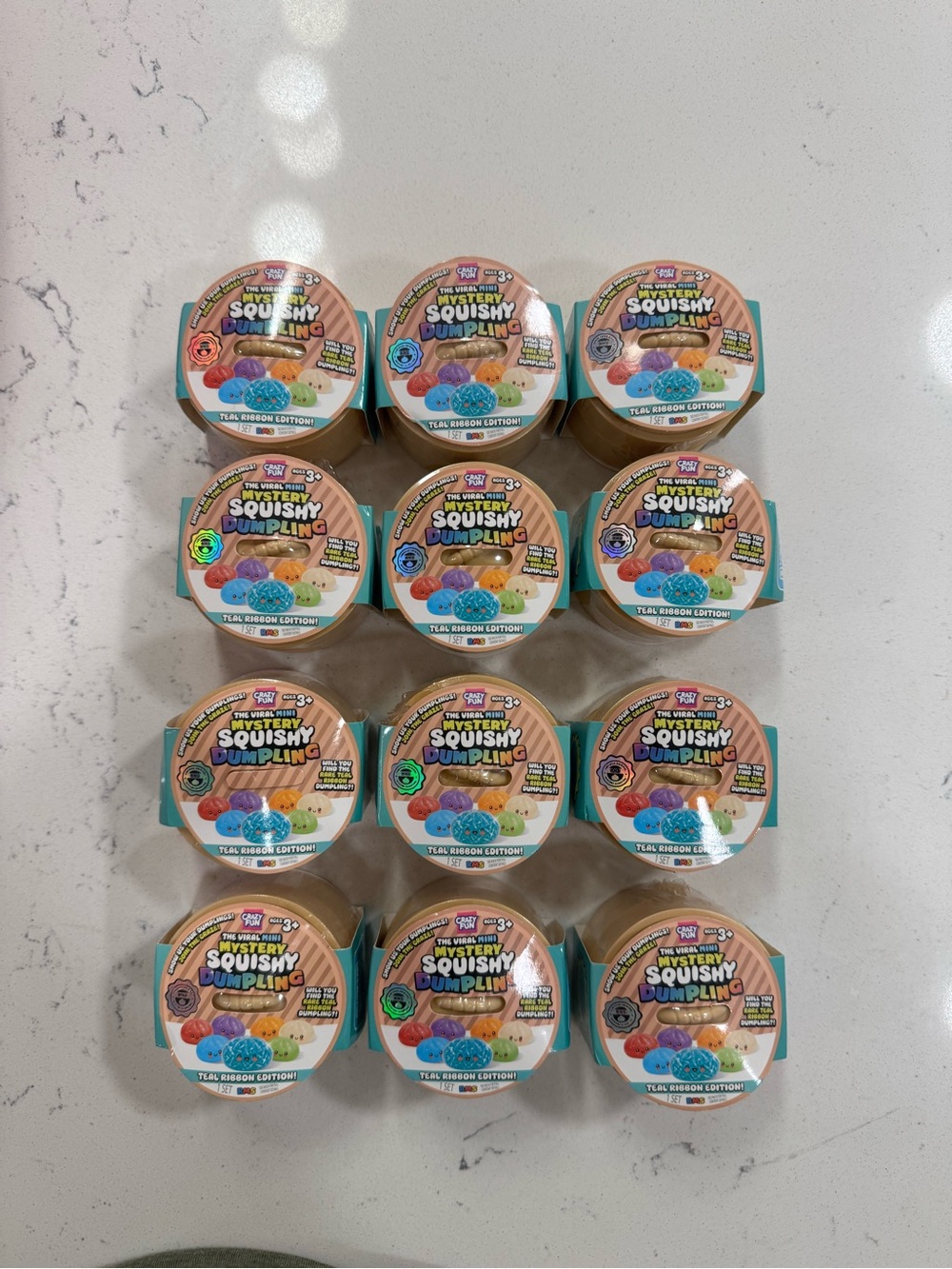 The viral MINI mystery squishy Dumpling teal ribbon edition Bundle ! Set of 12